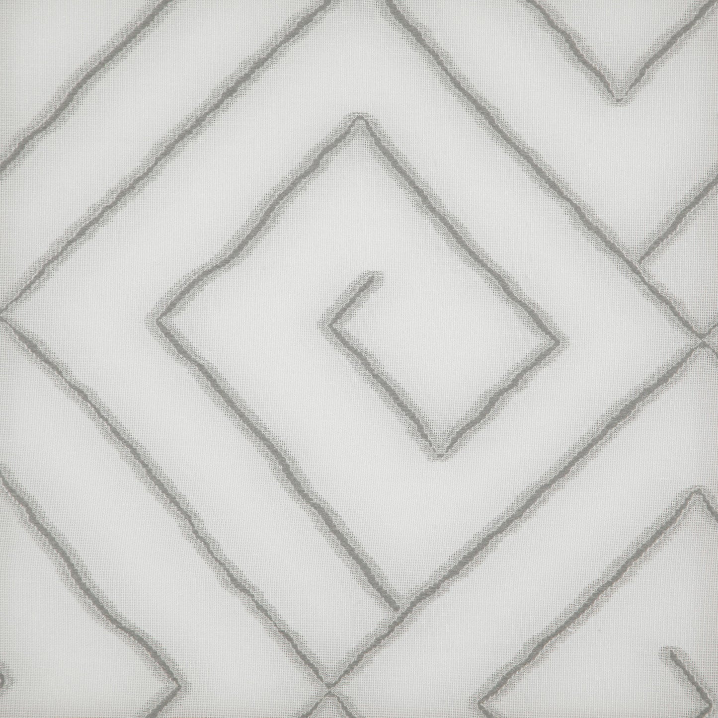 White jacquard fabric with an embossed light gray diamond geometric pattern for a modern decorative look.