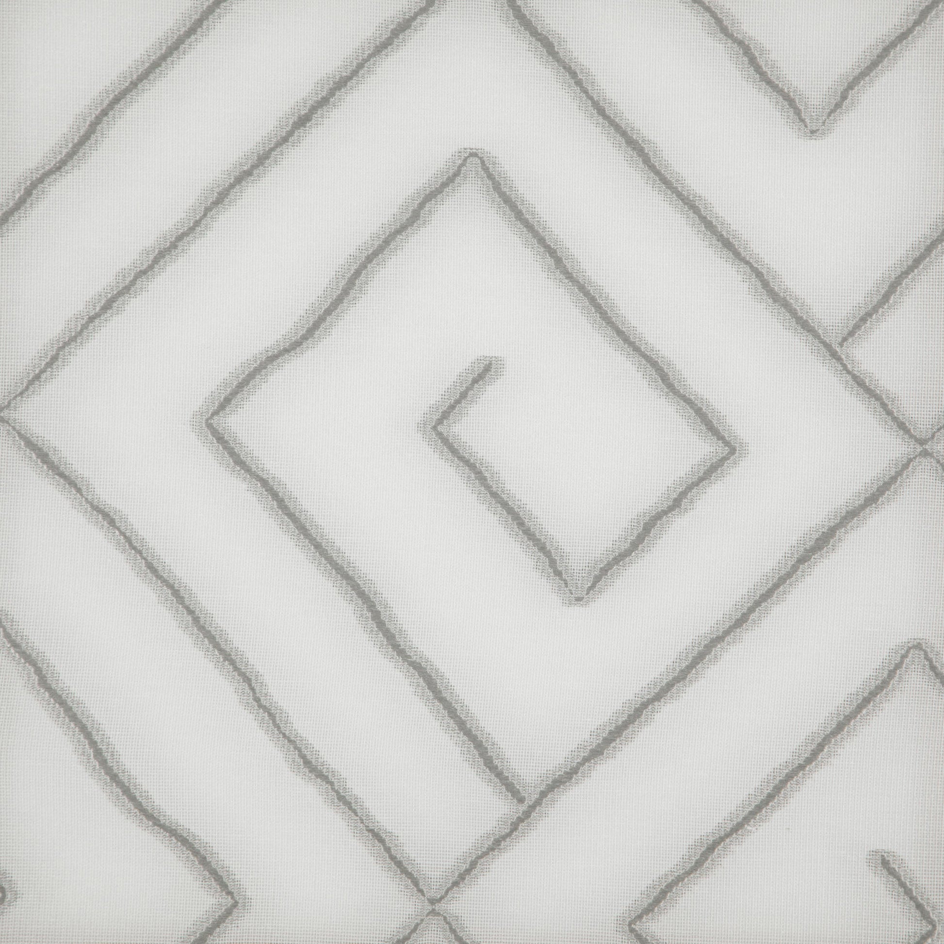 White jacquard fabric with an embossed light gray diamond geometric pattern for a modern decorative look.