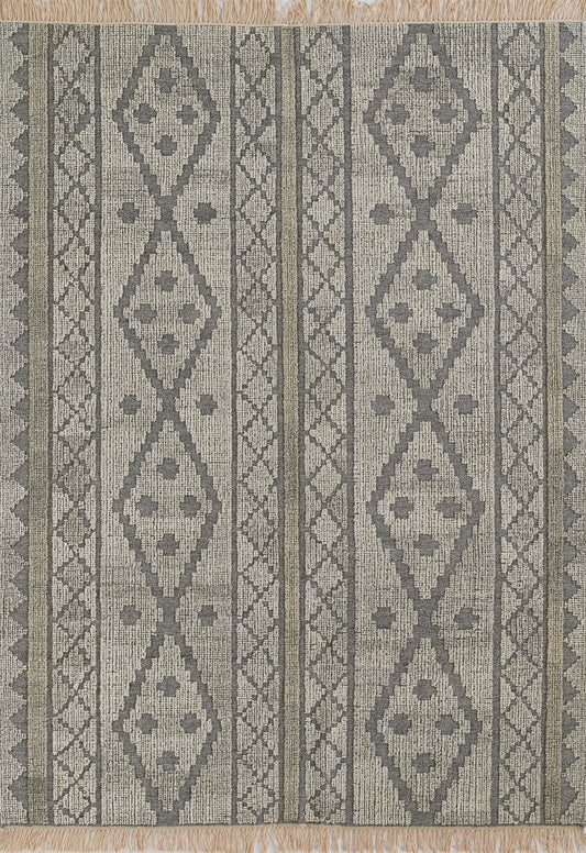Gray and beige geometric striped rug with diamond medallions, lattice borders and fringed ends.