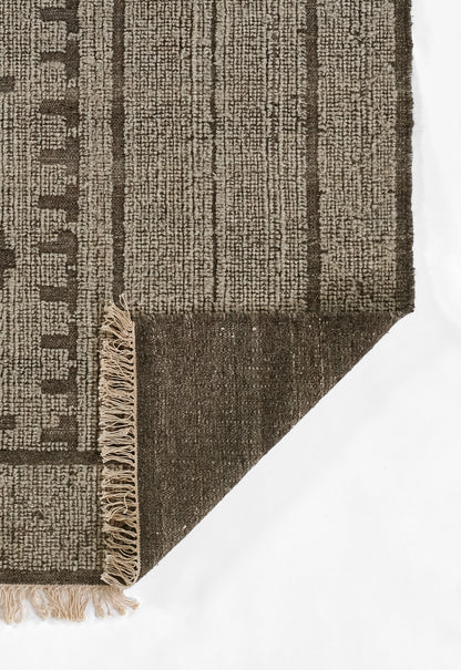 Brown and beige woven rug runner with geometric vertical stripes, dense texture, fringed edge and folded corner.