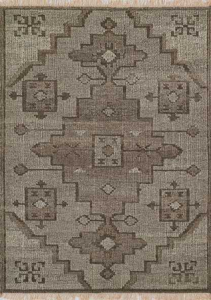 Antique-style beige and brown oriental rug with stepped geometric border, central medallion, and fringed ends.