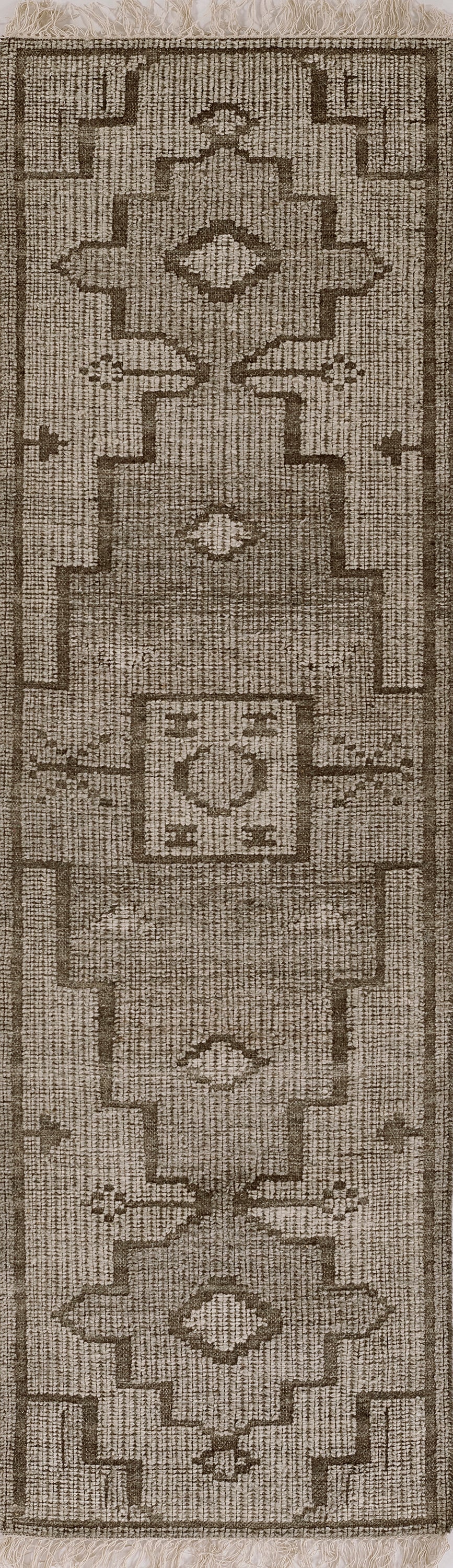 Beige-brown kilim-style rug runner with geometric motifs, central diamond medallions, bordered edges & fringe.