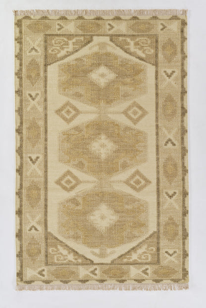Natural beige tribal rug with repeating hexagonal medallions, bordered by diamonds and fringe on both ends.
