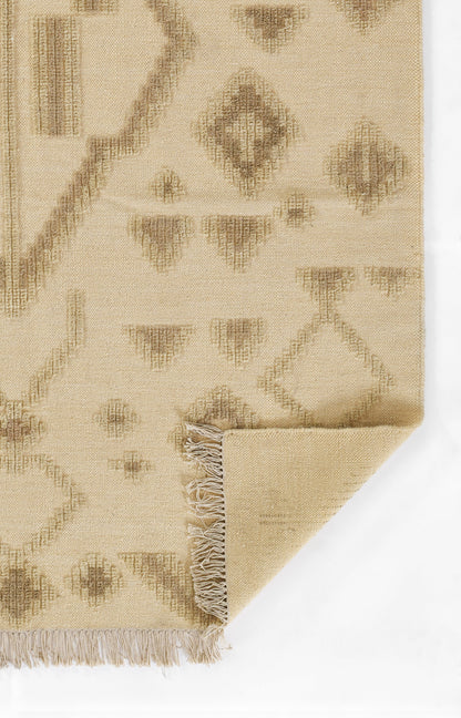 Beige geometric flat-weave rug with taupe diamond motifs and fringed edge; kilim-inspired design.
