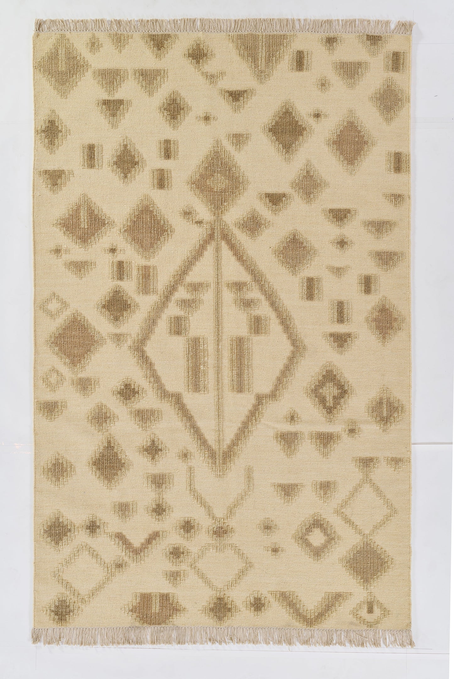 Beige kilim rug with taupe geometric diamonds and triangles, fringed edges.
