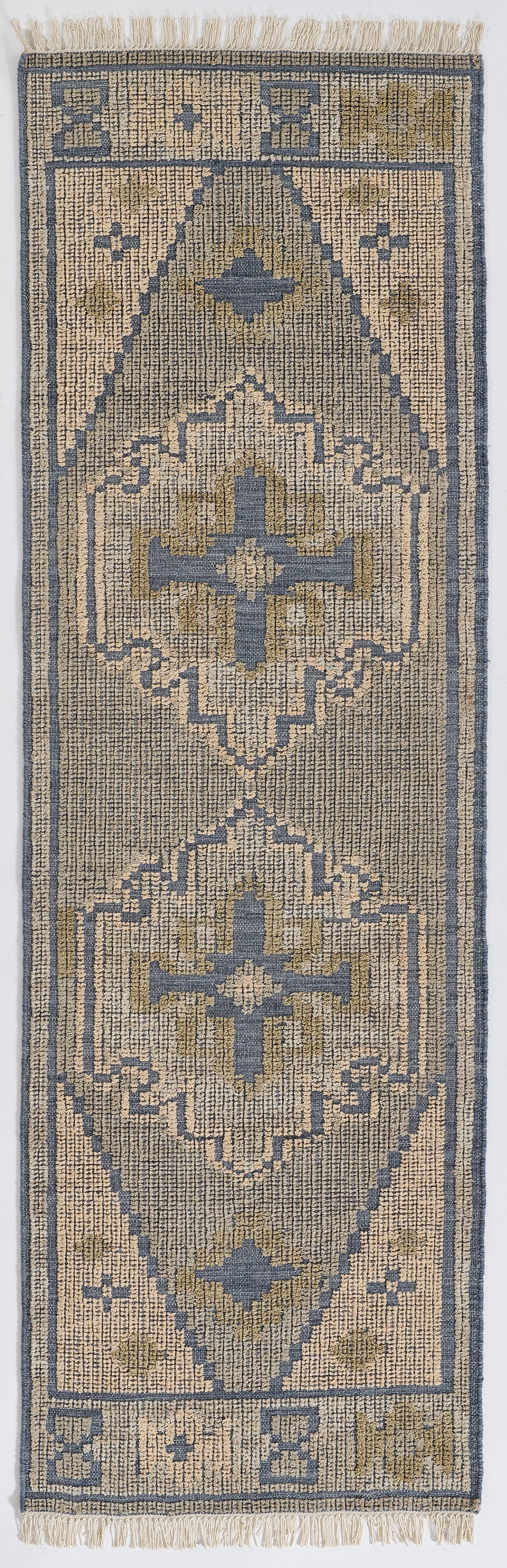 Long beige and blue-gray kilim runner rug with diamond medallions, fringe ends, woven flatweave.