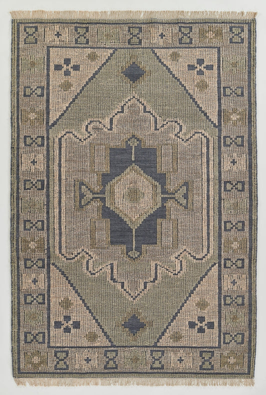 Geometric rug with dusty blue and tan palette, central diamond medallion, stepped arches, and a bordered frame with fringe.