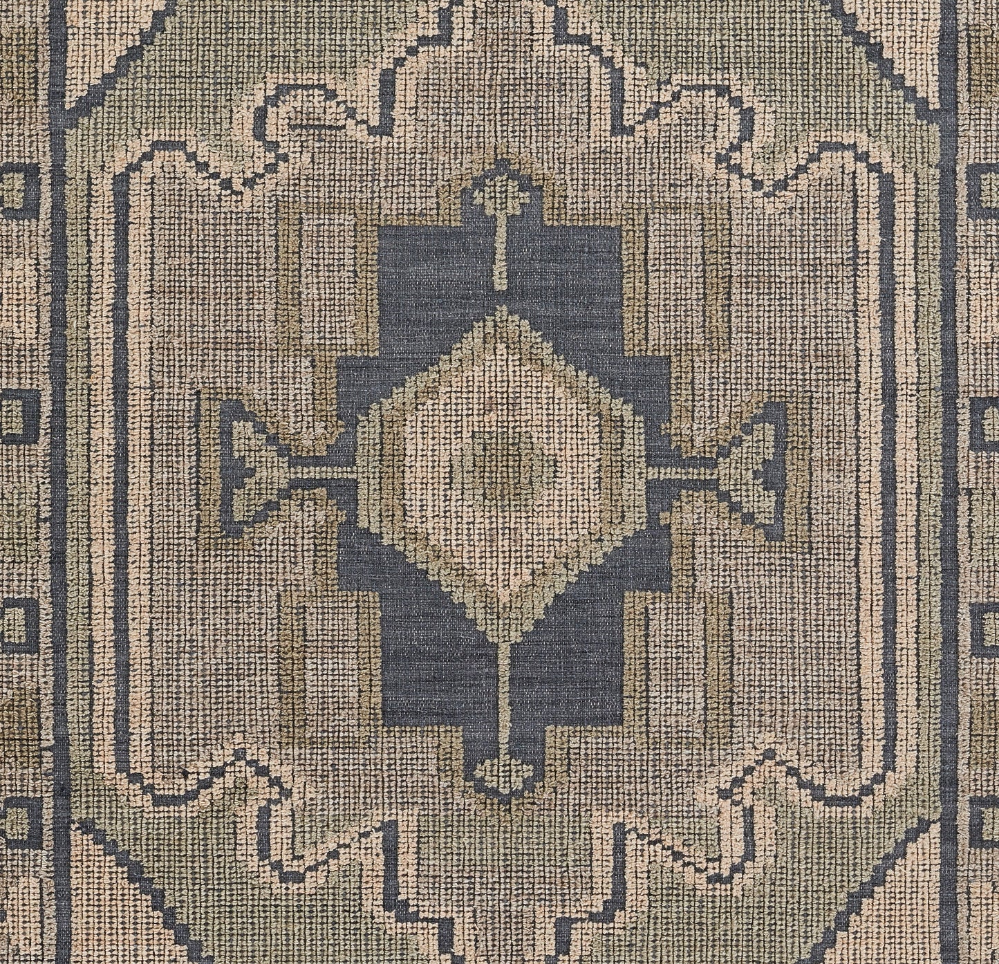 Blue and beige geometric oriental runner rug with a central diamond medallion and distressed woven texture.