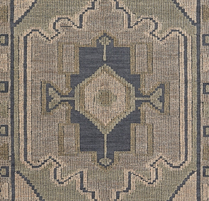 Blue and beige geometric rug with central diamond medallion and ornate border; woven, traditional oriental style.