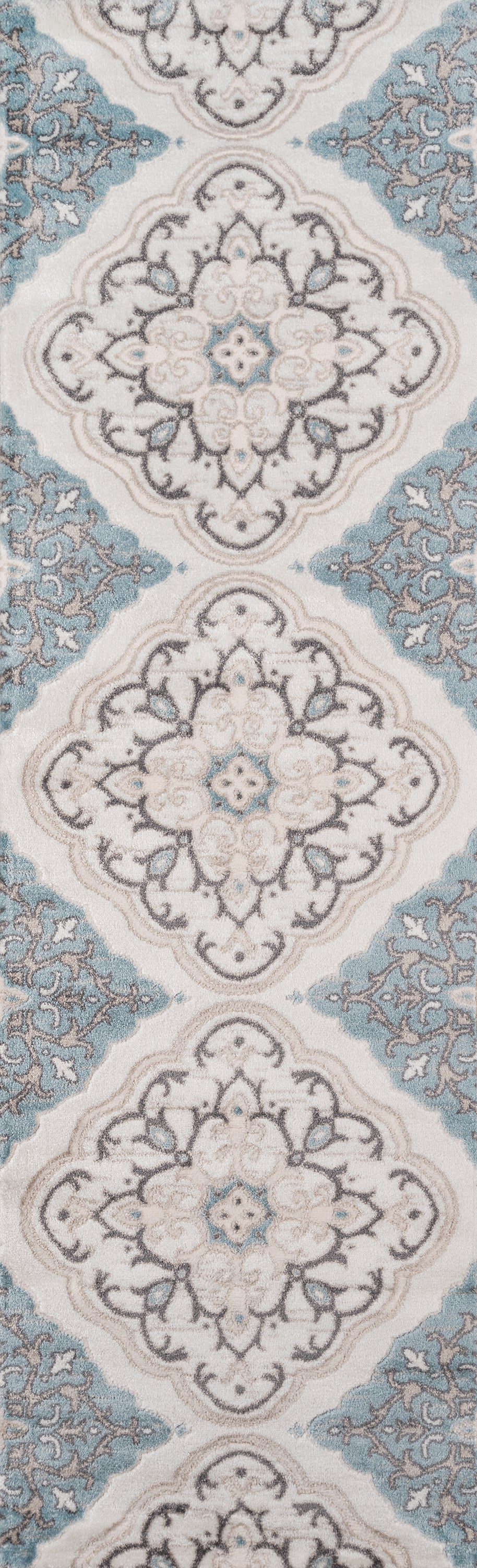 Ivory rug with blue damask medallion motifs and teal accents; ornate scrolling floral pattern.