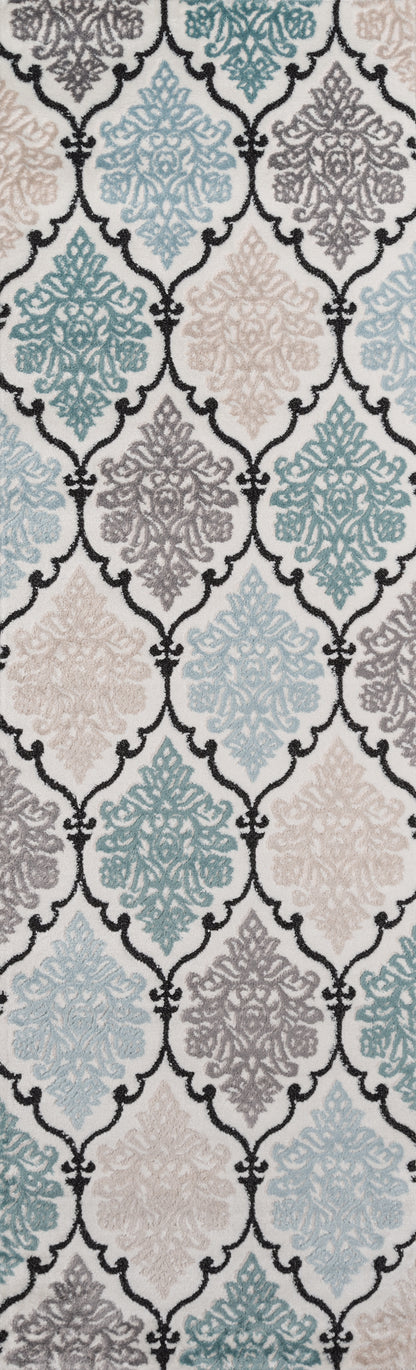 Pastel damask medallions with black lattice outlines; aqua, beige and taupe motifs on white.