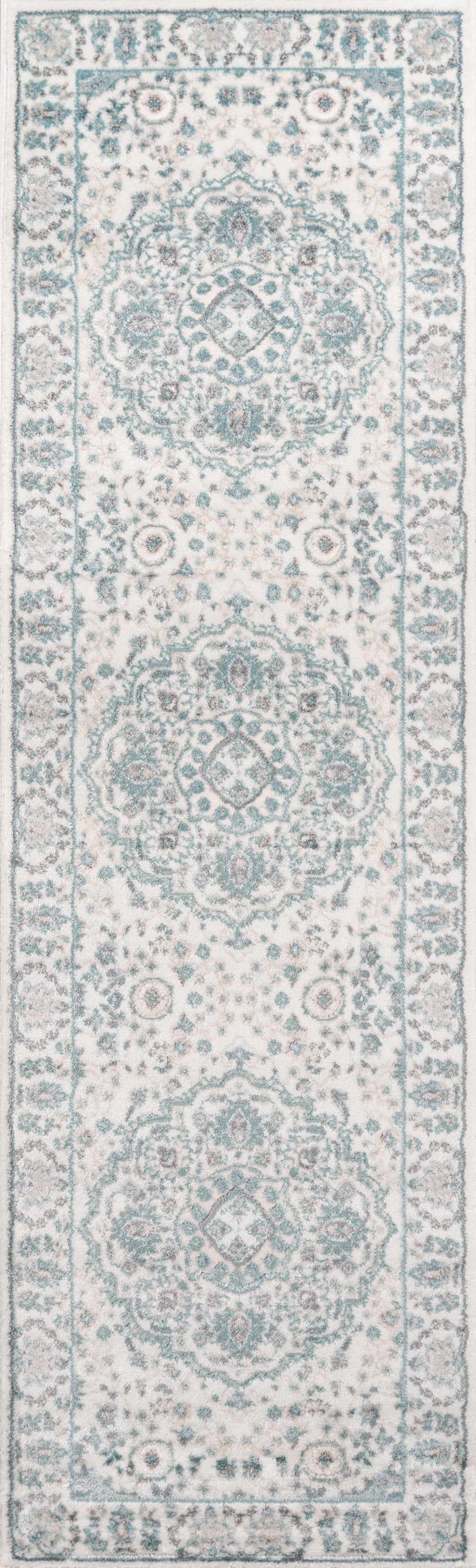 Ivory rug with teal-blue Persian medallions, intricate floral border and repeating motifs.