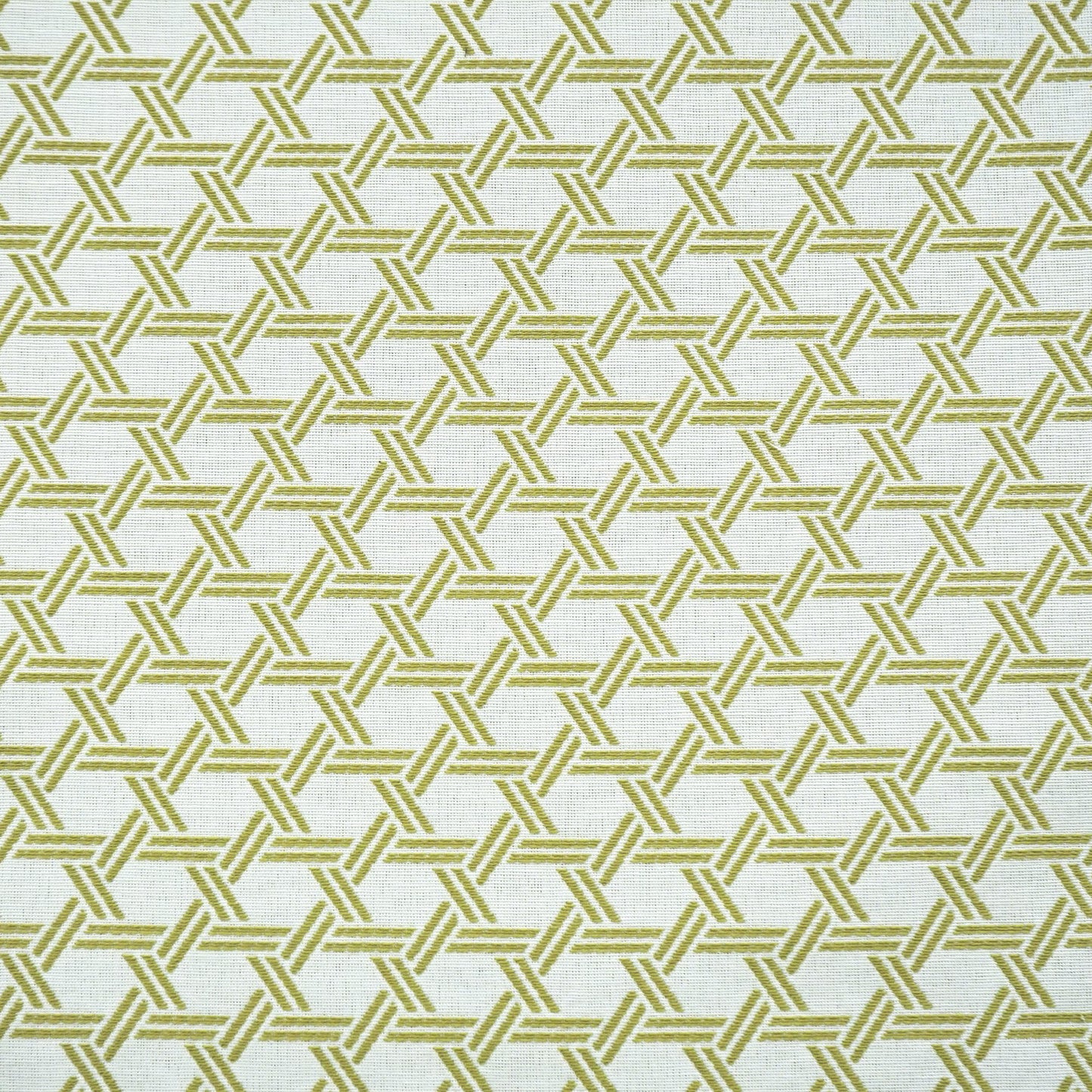 Khaki-green fabric with cream interlocking line lattice; geometric textile for upholstery or drapery.