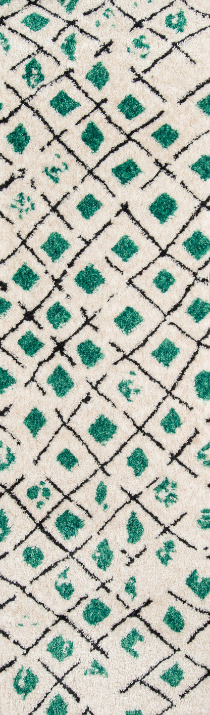 Cream shag rug with emerald green diamonds and black lattice lines; geometric Moroccan-inspired decor, 4' x 6'.