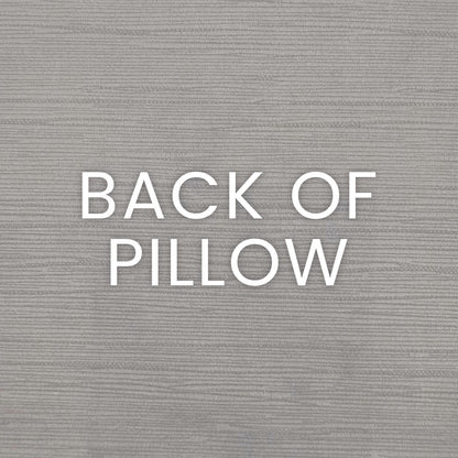 Gray wood-textured backdrop with bold white 'BACK OF PILLOW' lettering.