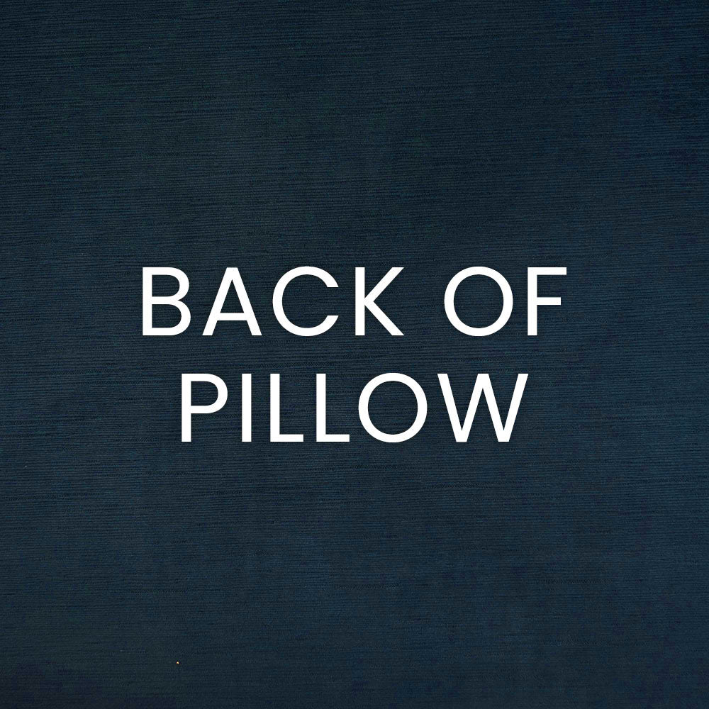 Navy blue textured fabric with white BACK OF PILLOW text indicating the pillow's reverse side.