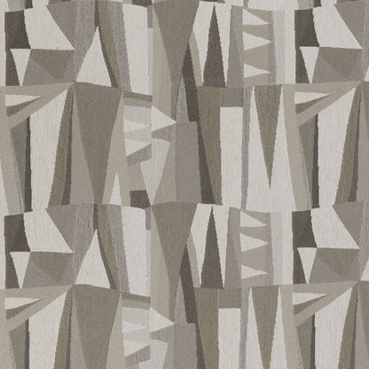 Geometric abstract fabric in beige, taupe and cream tones with triangular blocks; modern mid-century decor.
