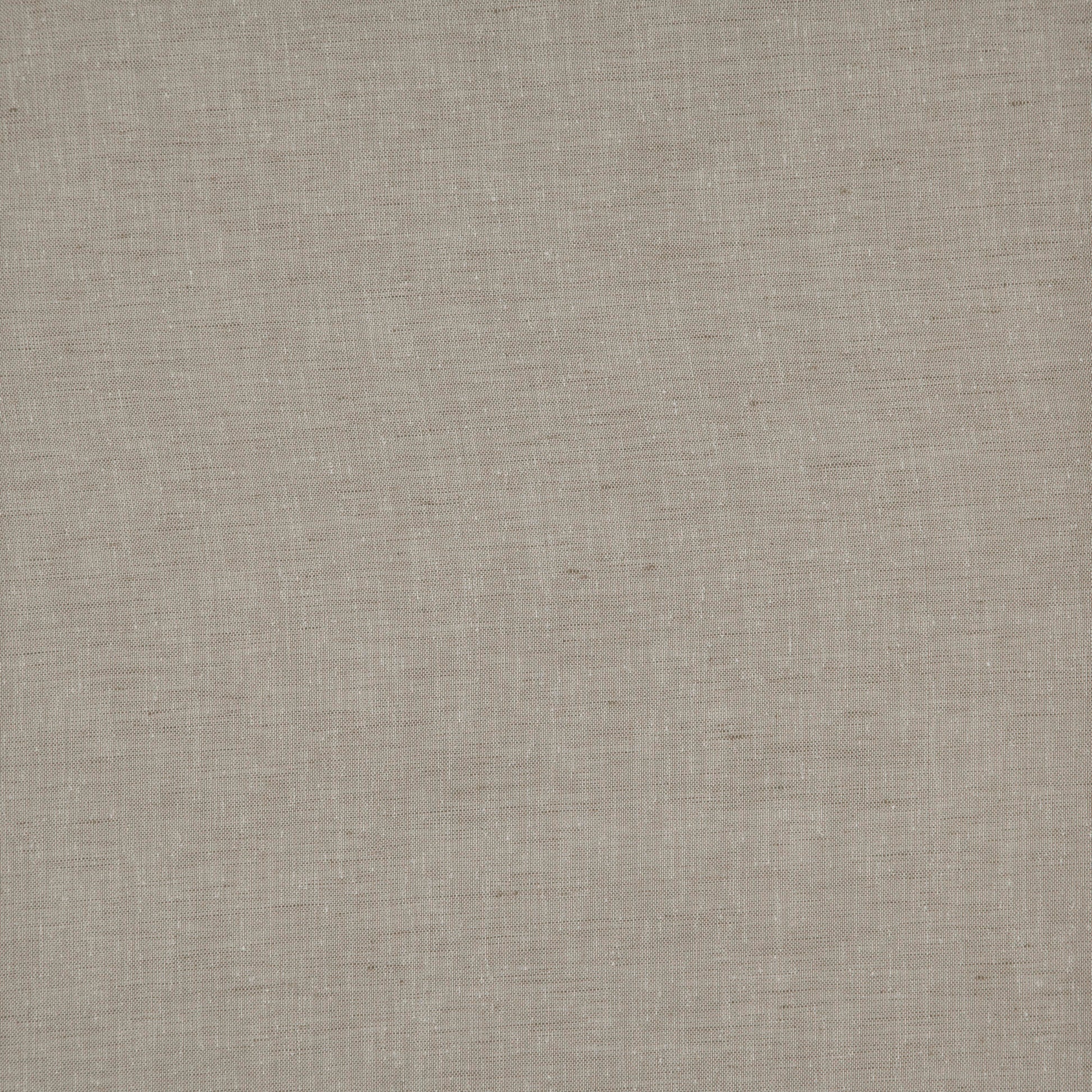Beige fabric texture with visible weave, close-up upholstery swatch.