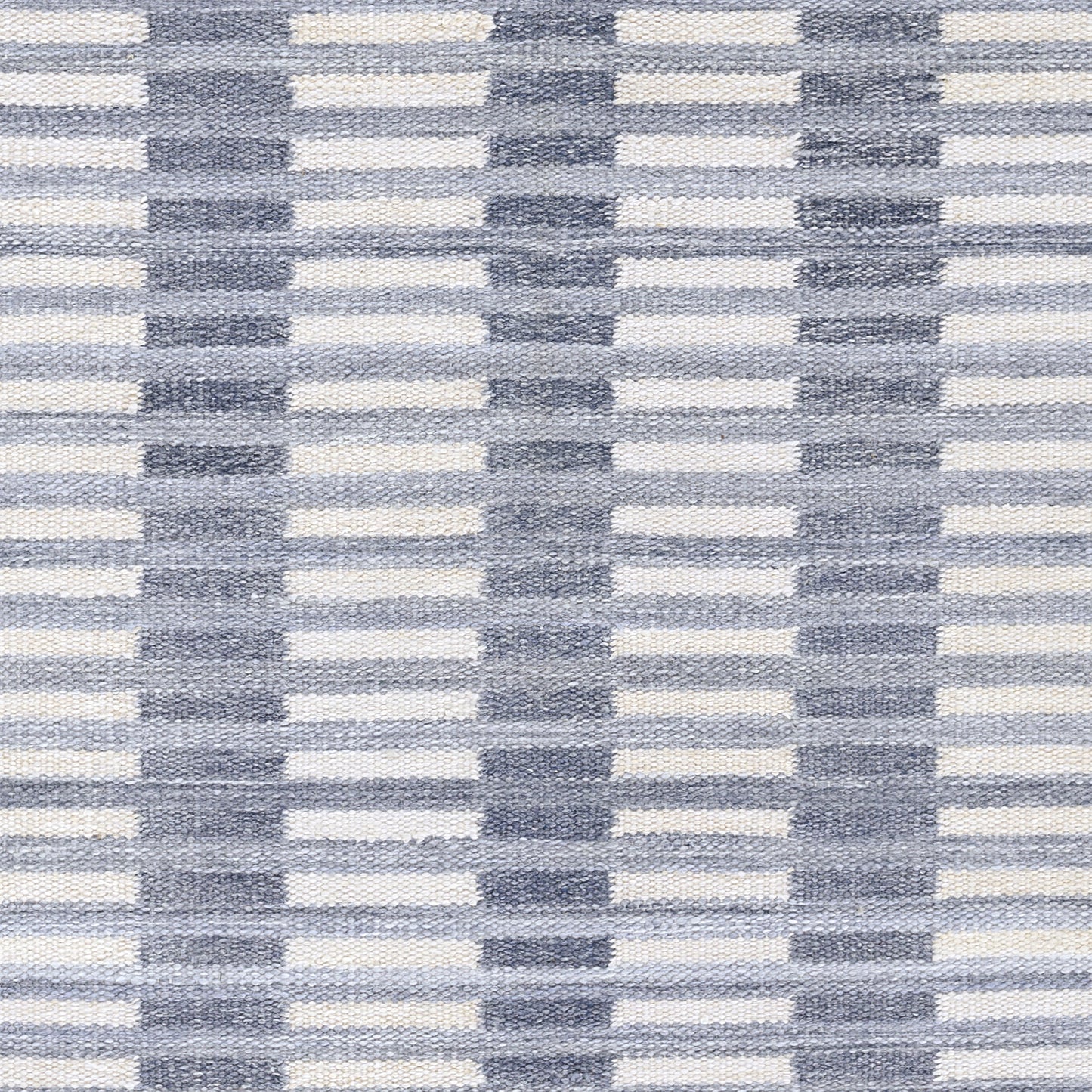 Blue and white striped woven rug runner with repeating vertical light-blue bars forming a grid.