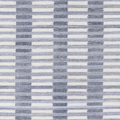 Blue and white striped woven rug runner with repeating vertical light-blue bars forming a grid.