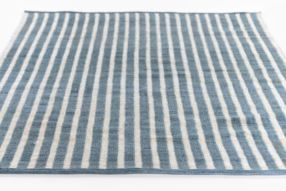 Blue and white striped flat-weave runner rug
