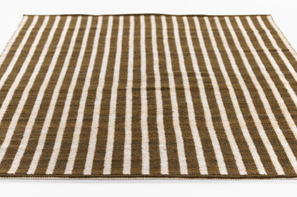 Brown & white striped rug, rectangular flat-weave with bold vertical stripes, modern coastal style.