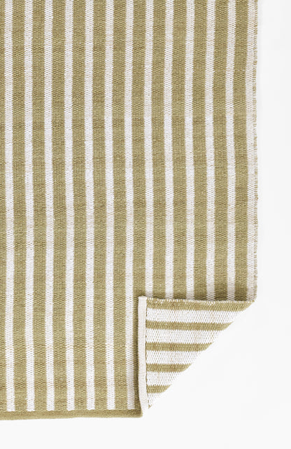 Khaki-green and white striped woven rug with folded corner.
