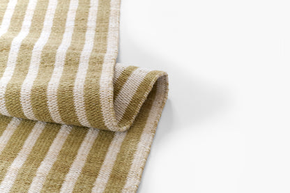 Khaki and cream striped woven cotton rug with rolled edge, rustic style.