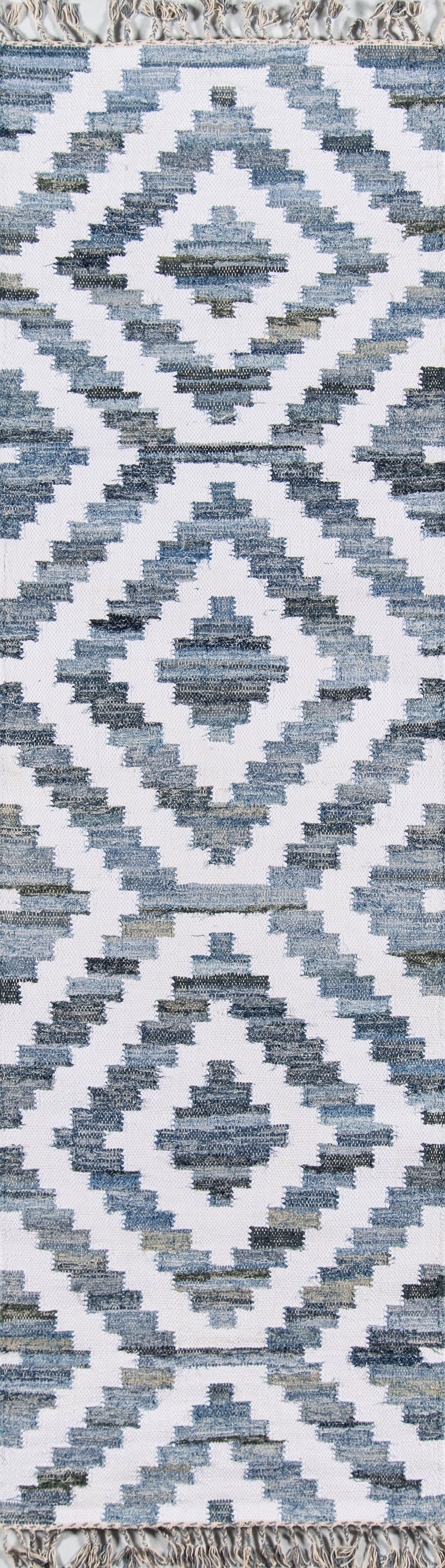 Blue-gray diamond-patterned rug with fringe ends, woven textile for living room decor.