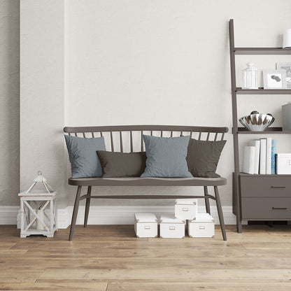 Cushions covered in Tide Herringbone fabric NJ25-444 in blue and taupe on a dark wood slat-back bench, beside a ladder shelf and white storage boxes.