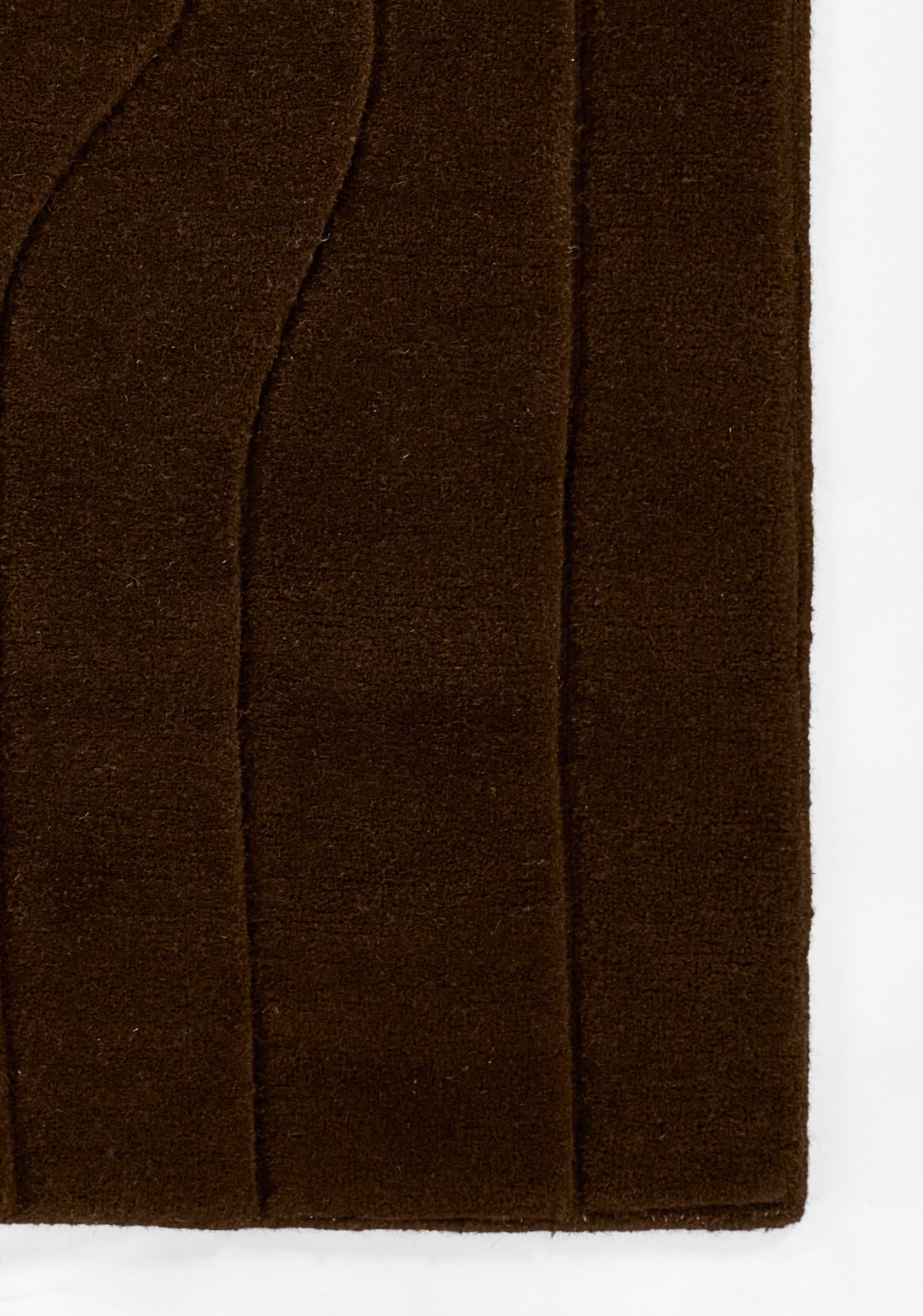 Brown suede-like fabric with vertical stitched panels and soft plush texture.