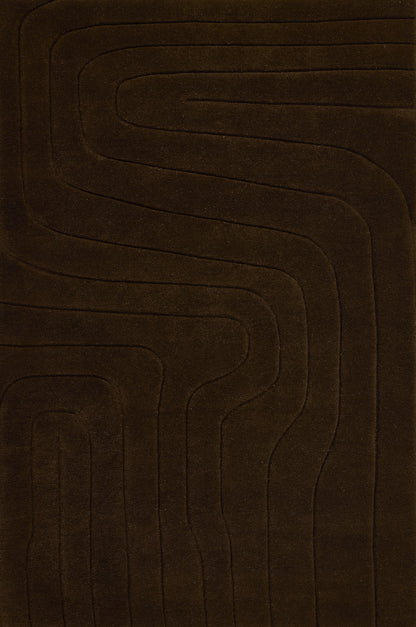 Brown area rug with embossed concentric rectangular channels, soft plush texture, modern geometric style.