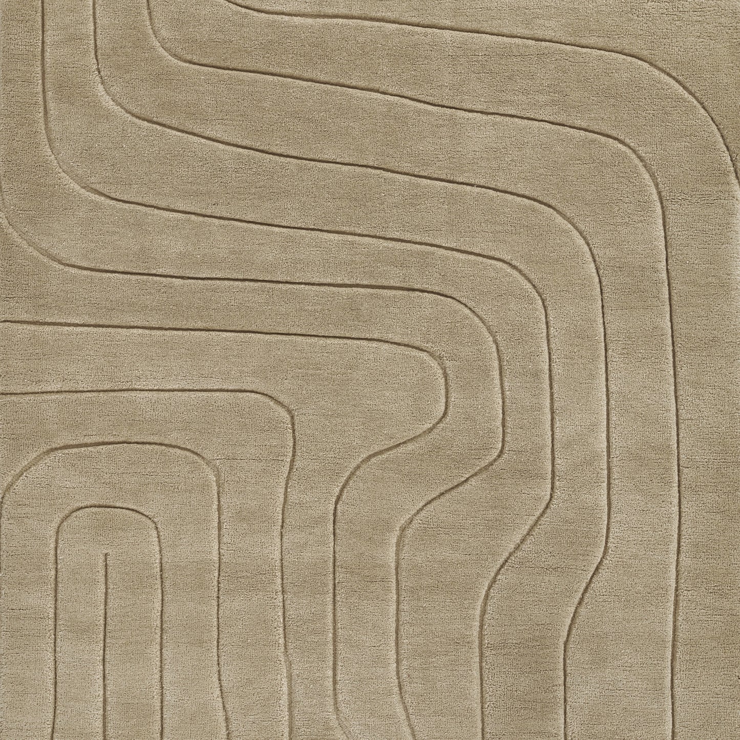 Beige modern rug with embossed curving lines forming a geometric labyrinth; soft plush pile.