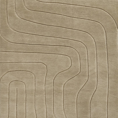 Beige modern rug with embossed curving lines forming a geometric labyrinth; soft plush pile.