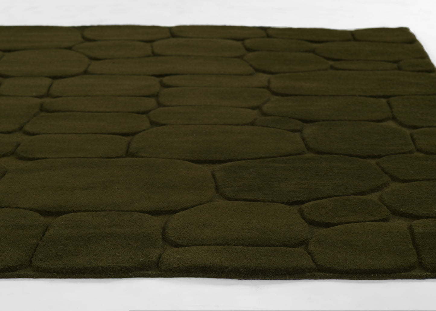 Olive green shag rug with irregular pebble-shaped panels and plush, textured surface; perfect as a cozy floor accent.