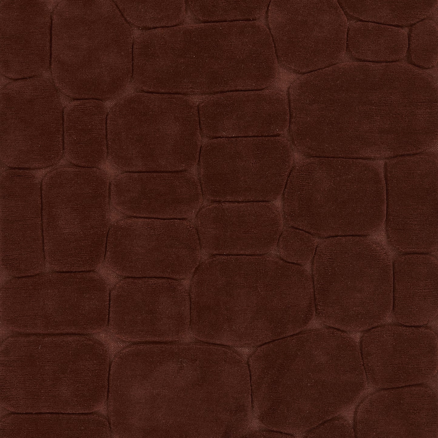 Dark burgundy faux crocodile leather texture with irregular scale pattern for upholstery & accessories.