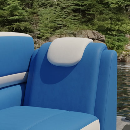 Blue solid fabric upholstery on a cushioned seat with a white padded headrest, lakeside scene with green trees in the background.