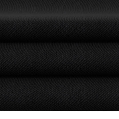 Black novelty fabric on a roll with diagonal, carbon-fiber textured weave.