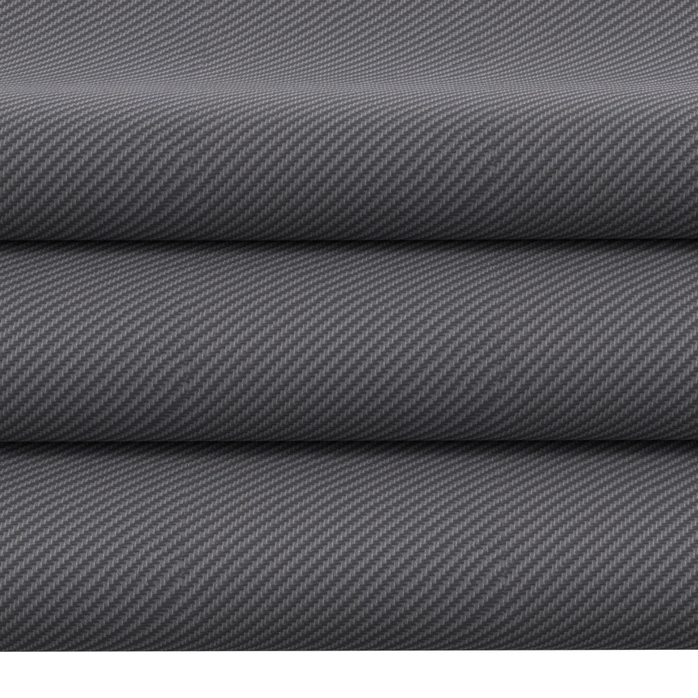 Gray novelty fabric rolls stacked, close-up diagonal weave.