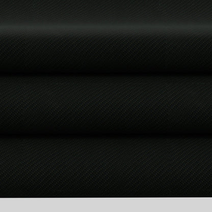 Three stacked black carbon-fiber textured fabric rolls with diagonal weave for automotive or tech use.