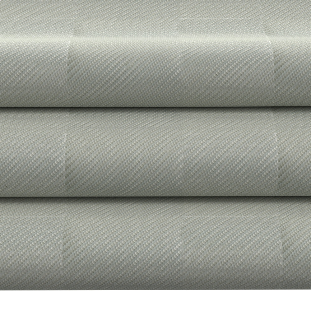 Light gray textured upholstery fabric rolls with a subtle dotted weave; durable home furniture fabric.