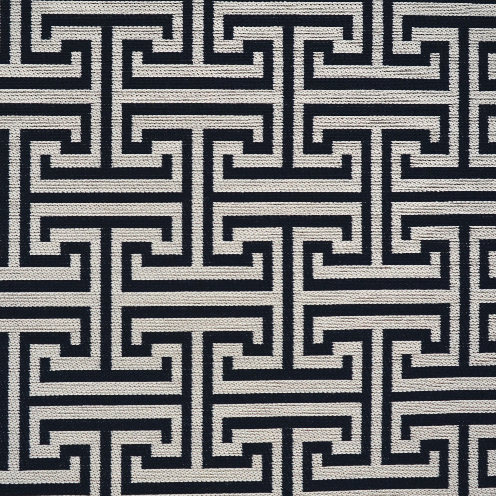 Navy & ivory woven fabric with Greek key meander pattern; upholstery or drapery textile.