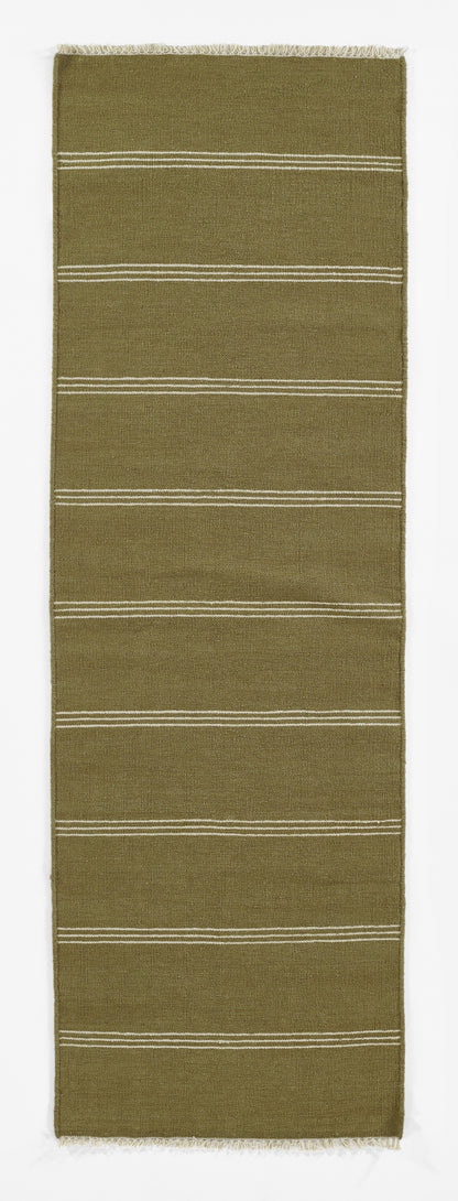 Olive green woven runner rug with white horizontal stripes and fringed ends.