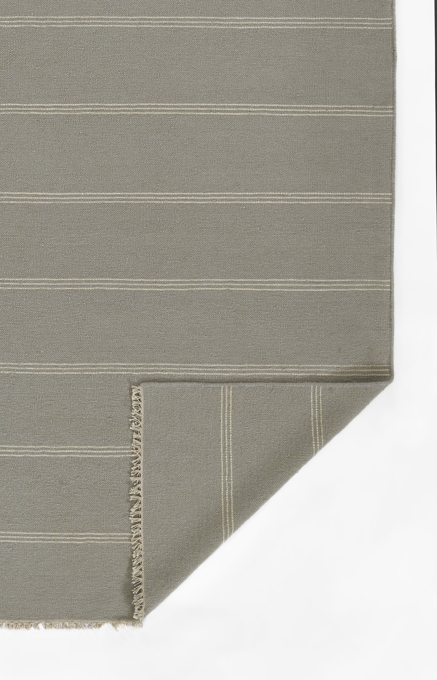 Taupe woven area rug, 10' x 14', with thin white stripes and fringed edges.