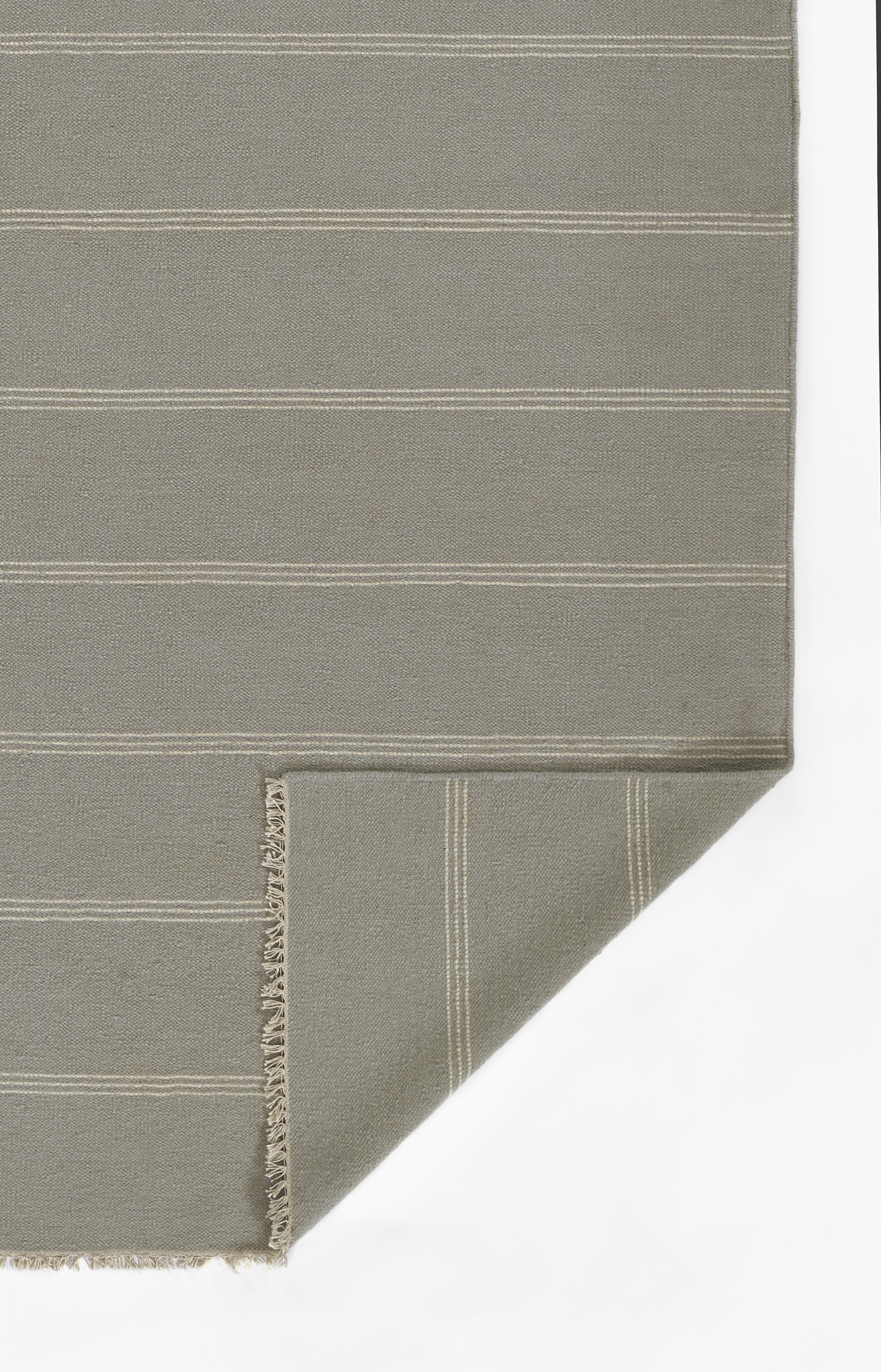 Taupe woven area rug, 10' x 14', with thin white stripes and fringed edges.