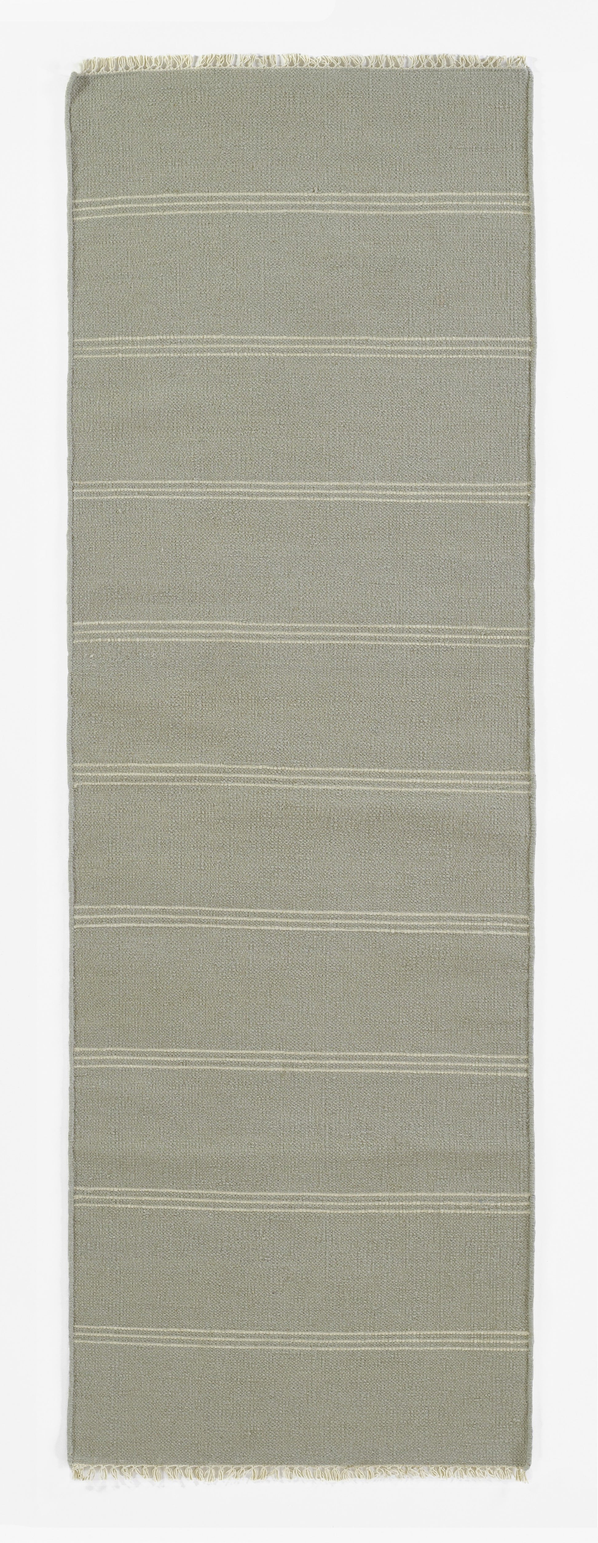 Beige-gray woven rug runner with subtle horizontal white stripes and fringed ends.