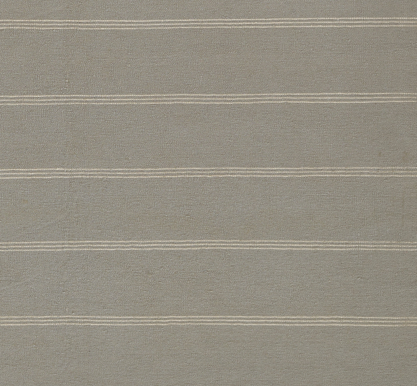 Beige woven fabric with multiple thin white horizontal stripes; linen-like texture.