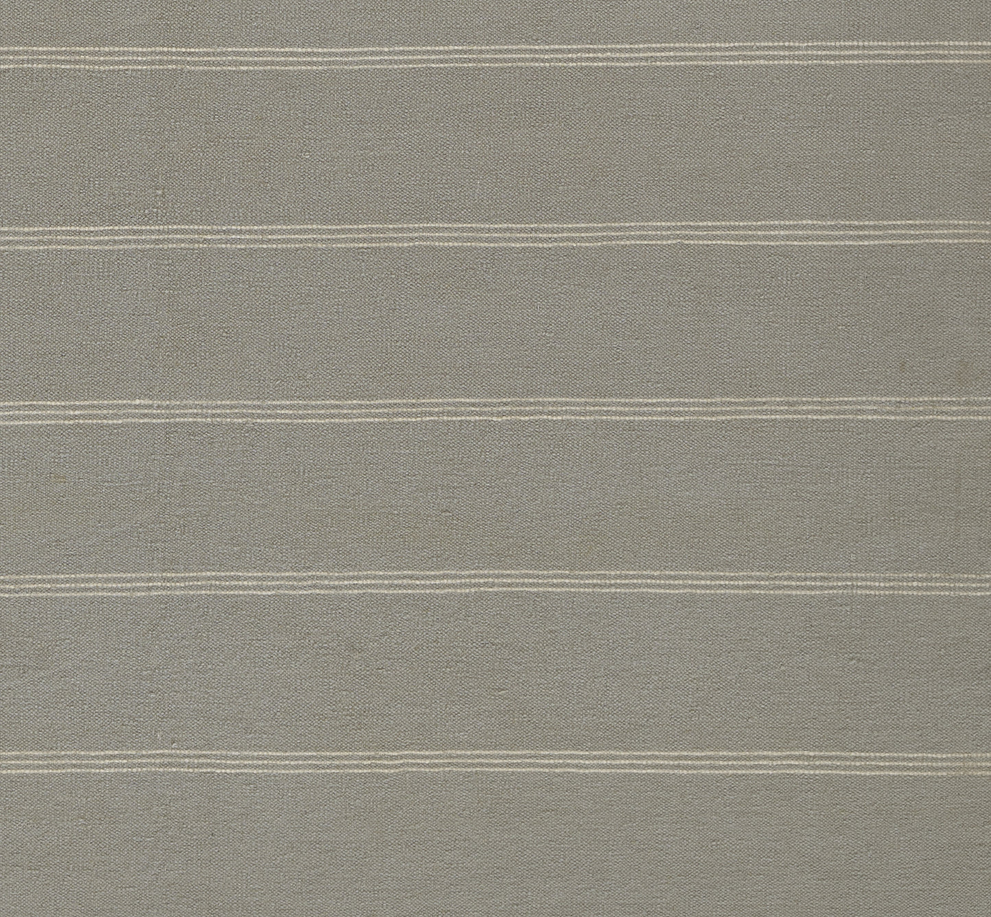 Greige linen-like rug runner with thin white horizontal stripes; woven texture; 3' x 8'.