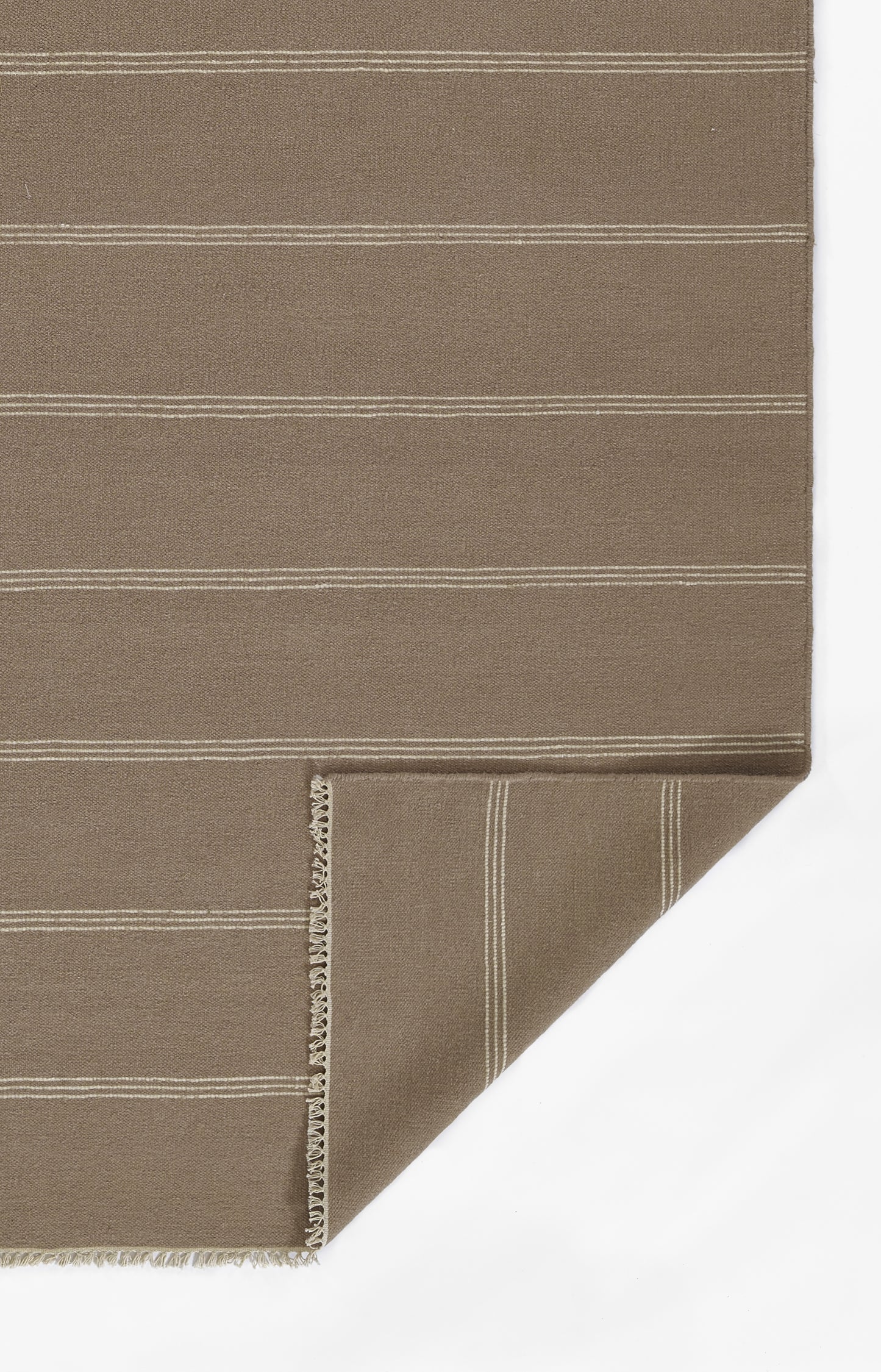 Taupe-brown woven table runner with thin white horizontal stripes and fringed edge.