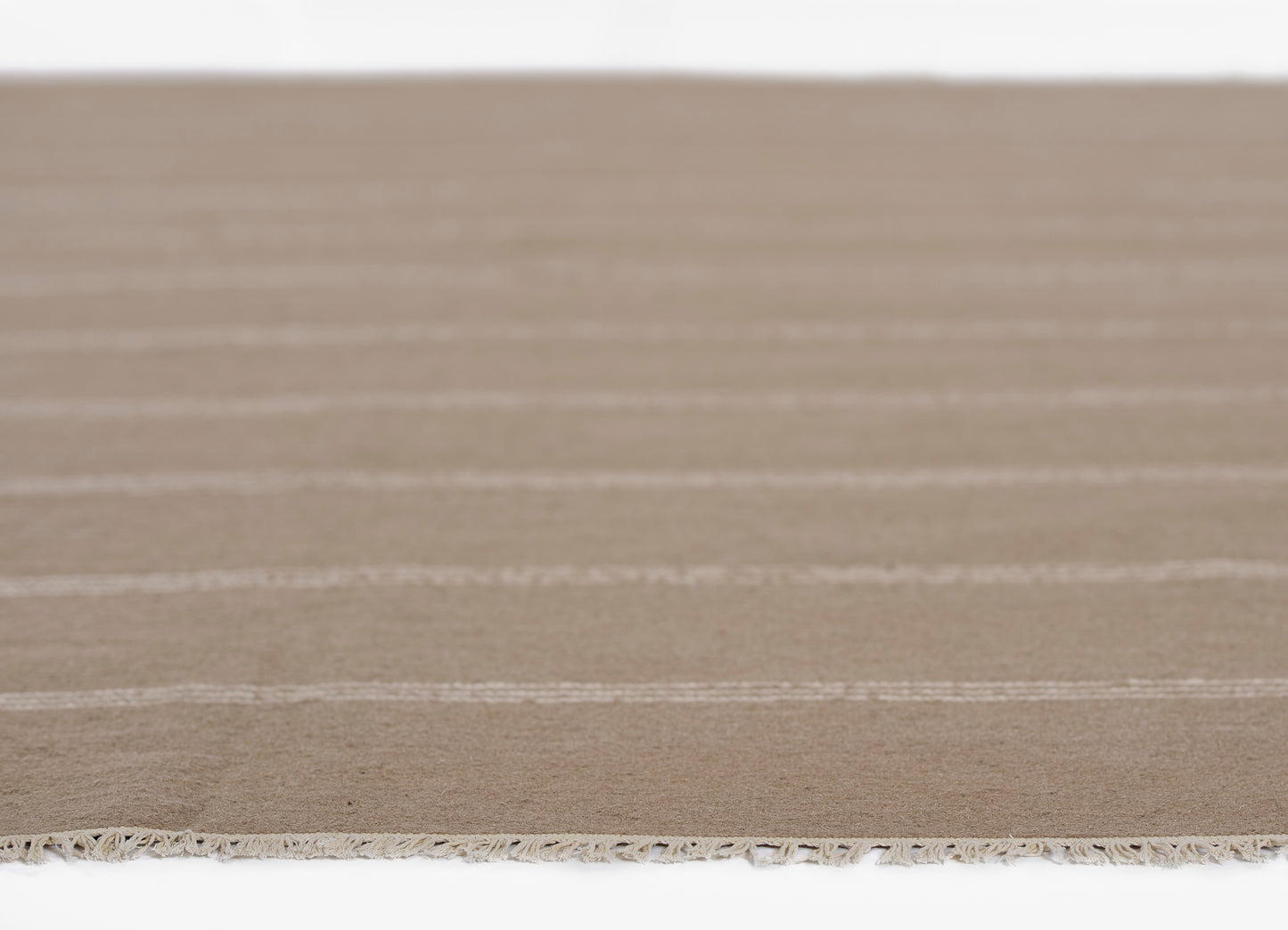 Tan flatwoven runner with cream stripes and fringed edge